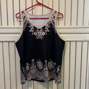 Brand new black and beige tank top with pretty motif trim. XXL.